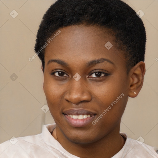 Joyful black young-adult female with short  black hair and brown eyes