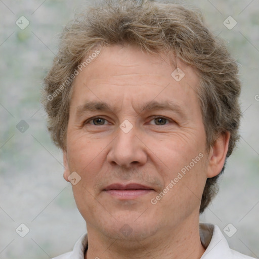 Joyful white middle-aged male with short  brown hair and brown eyes