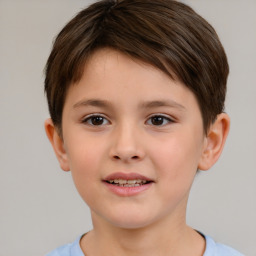 Joyful white child female with short  brown hair and brown eyes