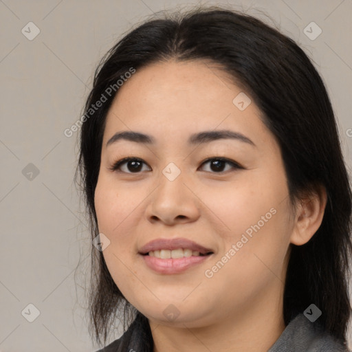 Joyful asian young-adult female with medium  black hair and brown eyes