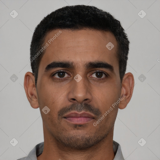 Neutral latino young-adult male with short  black hair and brown eyes