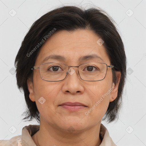 Joyful white adult female with medium  brown hair and brown eyes