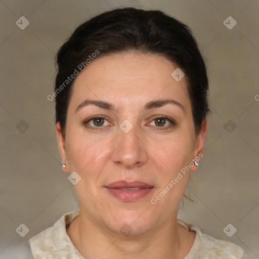 Joyful white adult female with short  brown hair and brown eyes