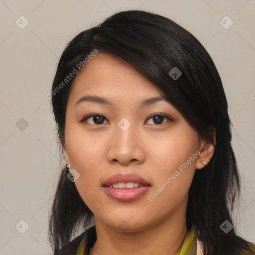 Joyful asian young-adult female with medium  black hair and brown eyes