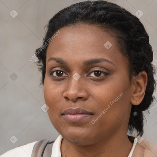 Joyful black young-adult female with medium  brown hair and brown eyes