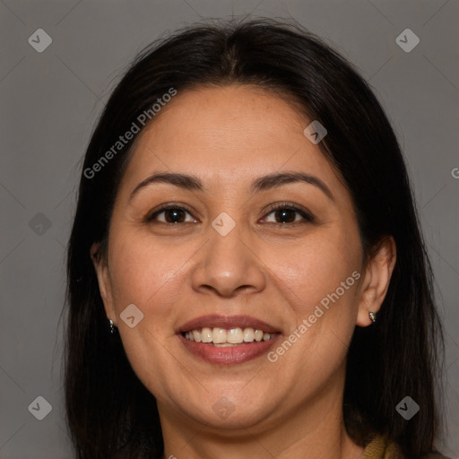 Joyful white adult female with long  brown hair and brown eyes