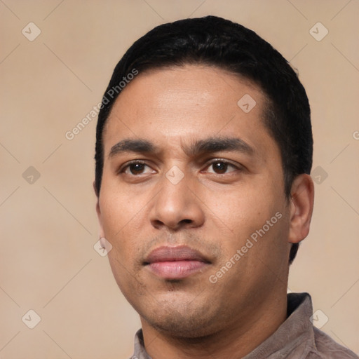 Neutral latino young-adult male with short  black hair and brown eyes