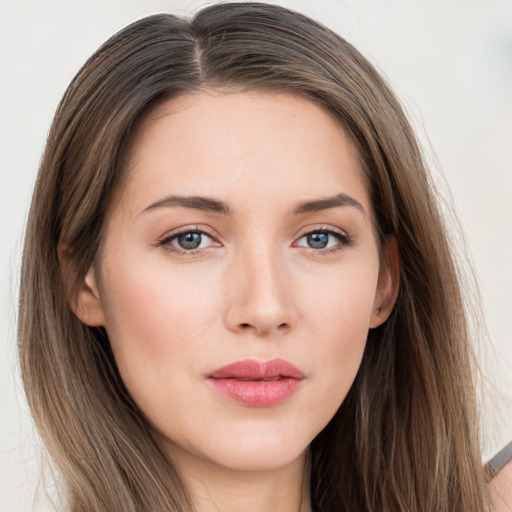 Neutral white young-adult female with long  brown hair and grey eyes