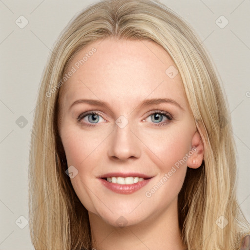 Joyful white young-adult female with long  brown hair and blue eyes