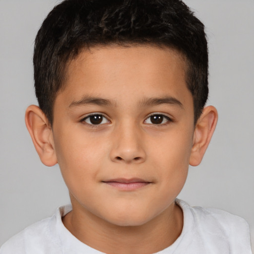 Joyful white child male with short  brown hair and brown eyes