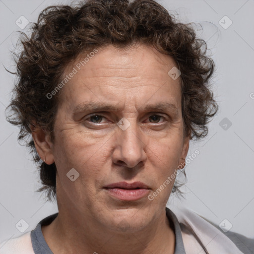 Joyful white adult male with medium  brown hair and brown eyes