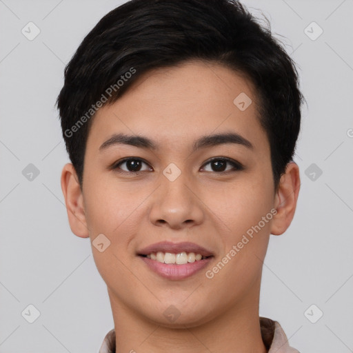 Joyful asian young-adult female with short  black hair and brown eyes