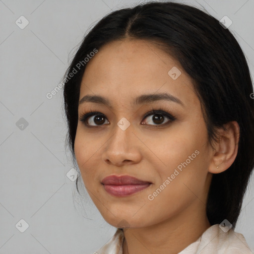 Joyful latino young-adult female with medium  black hair and brown eyes