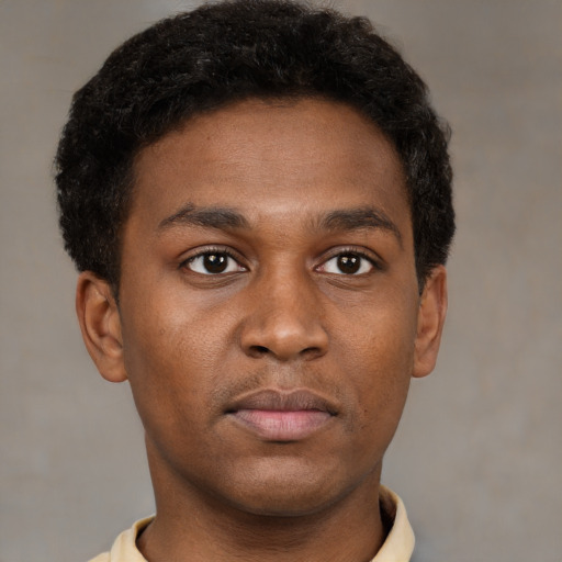 Neutral black young-adult male with short  brown hair and brown eyes