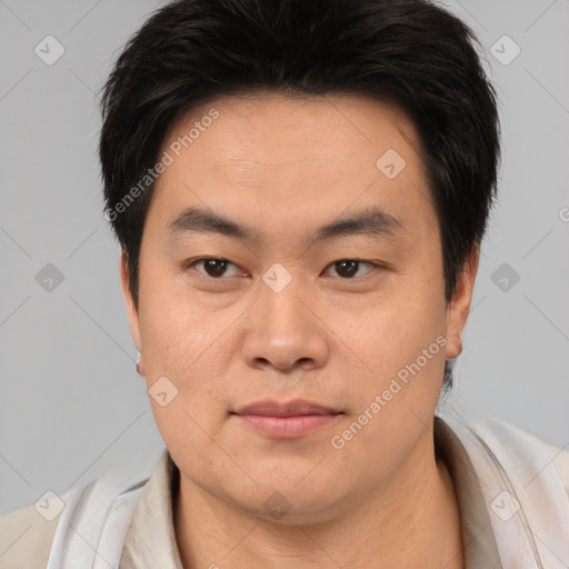 Neutral white young-adult male with short  black hair and brown eyes