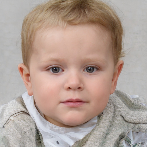 Neutral white child male with short  brown hair and blue eyes