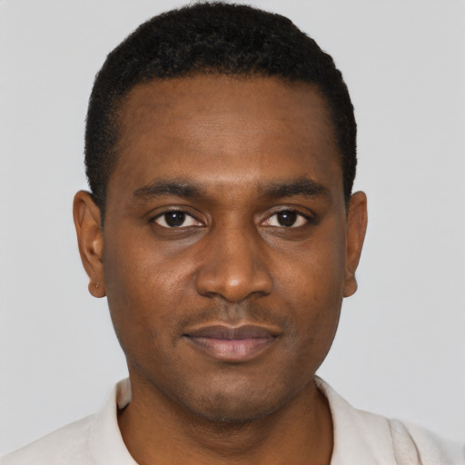 Neutral black young-adult male with short  black hair and brown eyes