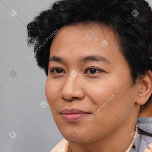 Joyful asian young-adult female with short  brown hair and brown eyes