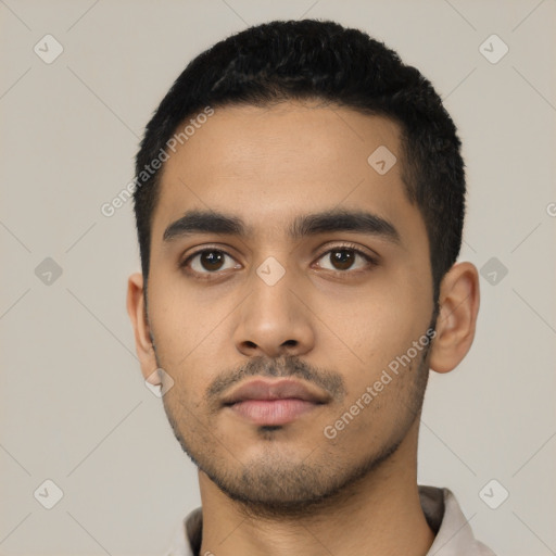 Neutral latino young-adult male with short  black hair and brown eyes