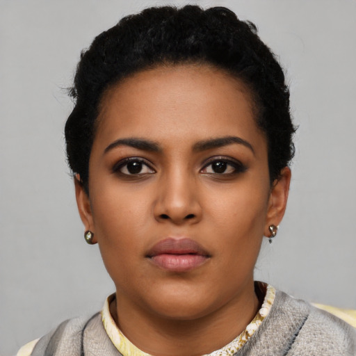 Neutral latino young-adult female with short  black hair and brown eyes