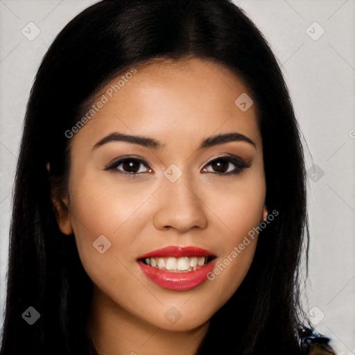 Joyful latino young-adult female with long  brown hair and brown eyes