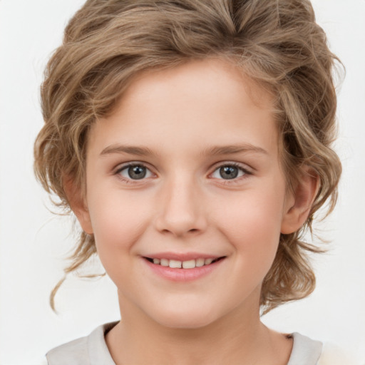 Joyful white child female with medium  brown hair and grey eyes