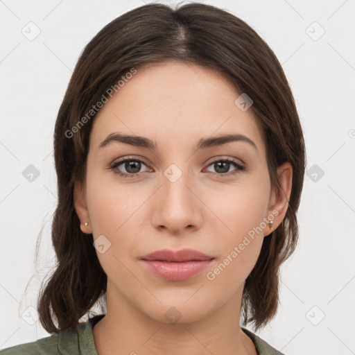 Neutral white young-adult female with medium  brown hair and brown eyes