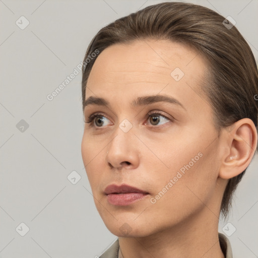 Neutral white young-adult female with short  brown hair and brown eyes