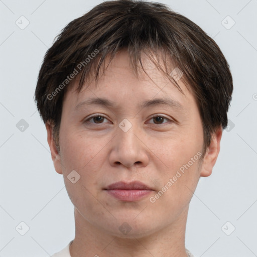 Joyful white adult female with short  brown hair and brown eyes