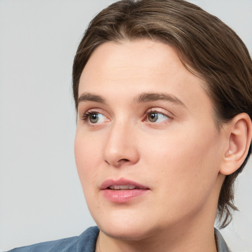 Neutral white young-adult female with medium  brown hair and blue eyes