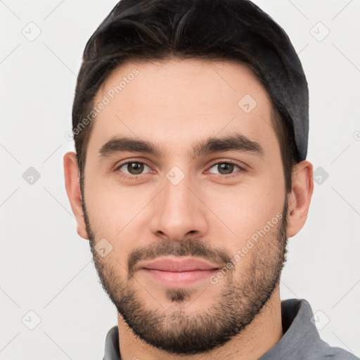 Neutral white young-adult male with short  brown hair and brown eyes