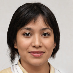 Joyful white young-adult female with medium  brown hair and brown eyes