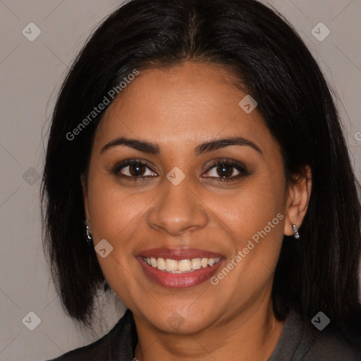 Joyful latino young-adult female with long  brown hair and brown eyes