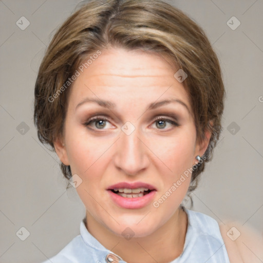 Joyful white adult female with medium  brown hair and blue eyes