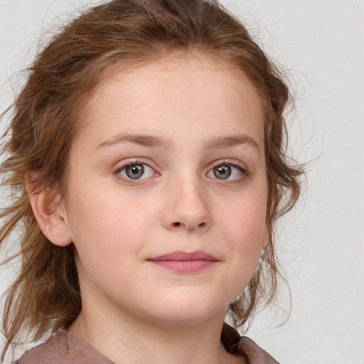 Joyful white child female with medium  brown hair and grey eyes