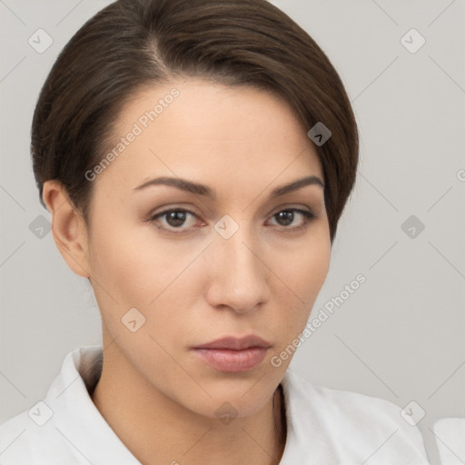 Neutral white young-adult female with short  brown hair and brown eyes