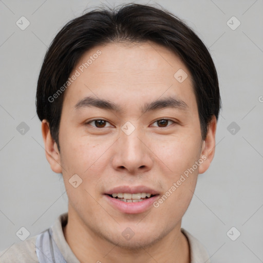 Joyful asian young-adult male with short  brown hair and brown eyes