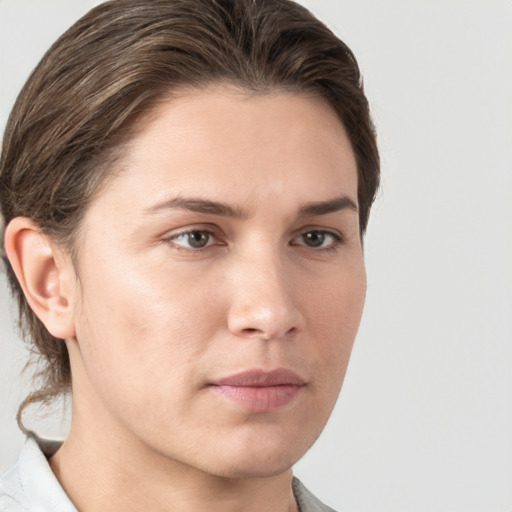 Neutral white young-adult female with medium  brown hair and brown eyes