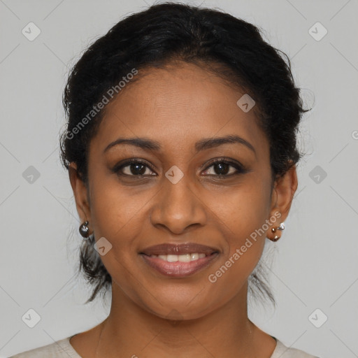 Joyful black young-adult female with medium  brown hair and brown eyes