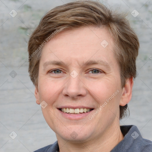 Joyful white adult female with short  brown hair and grey eyes