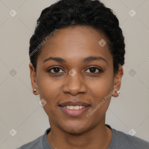 Joyful black young-adult female with short  black hair and brown eyes