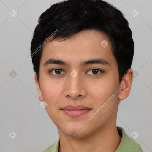 Joyful white young-adult male with short  black hair and brown eyes