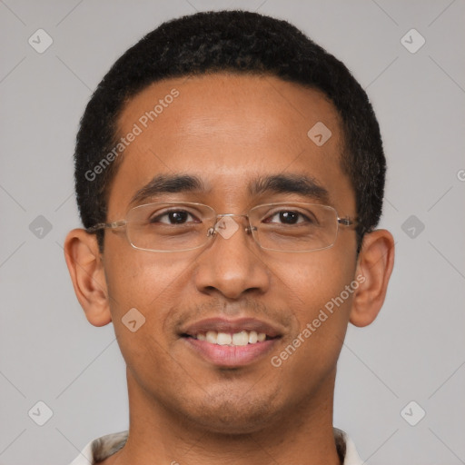 Joyful latino young-adult male with short  brown hair and brown eyes