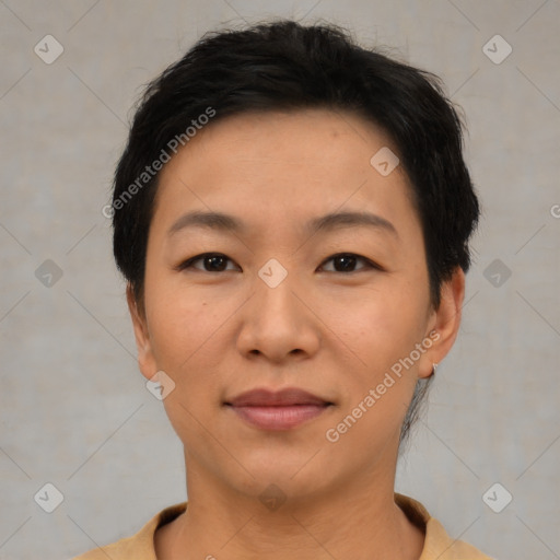 Joyful asian young-adult female with short  brown hair and brown eyes