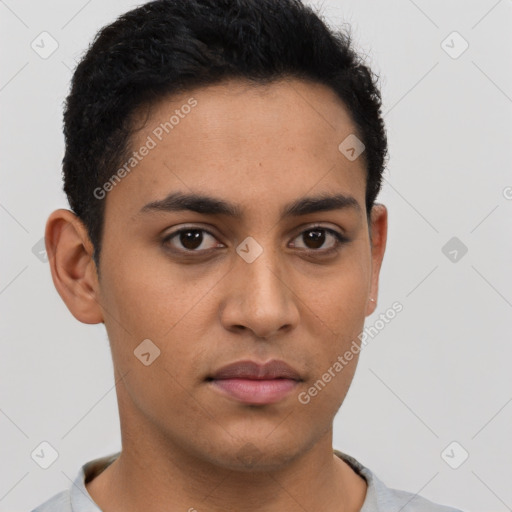 Neutral latino young-adult male with short  black hair and brown eyes