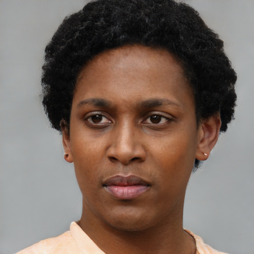 Neutral black young-adult female with short  black hair and brown eyes