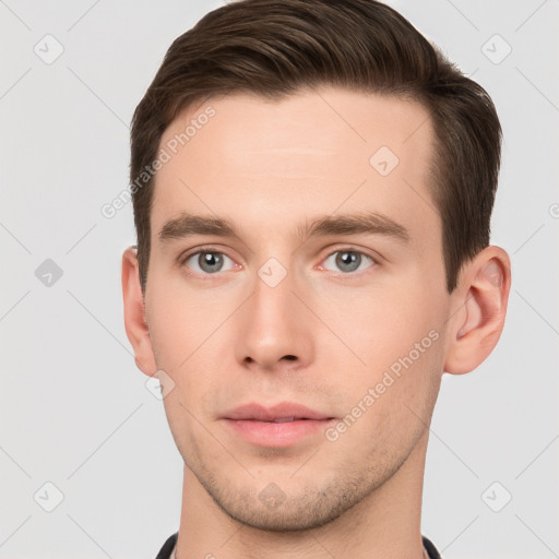 Neutral white young-adult male with short  brown hair and brown eyes