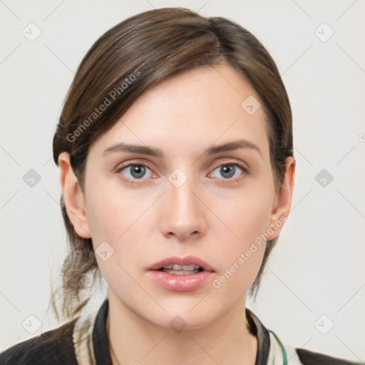 Neutral white young-adult female with medium  brown hair and grey eyes