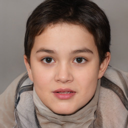 Joyful white child female with short  brown hair and brown eyes