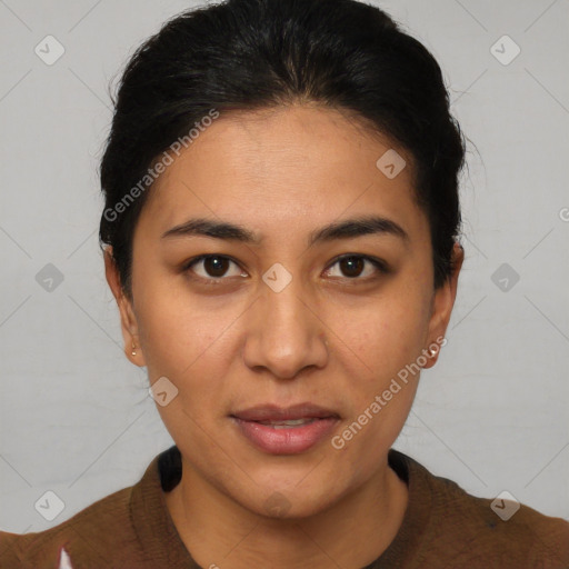 Joyful latino young-adult female with short  brown hair and brown eyes